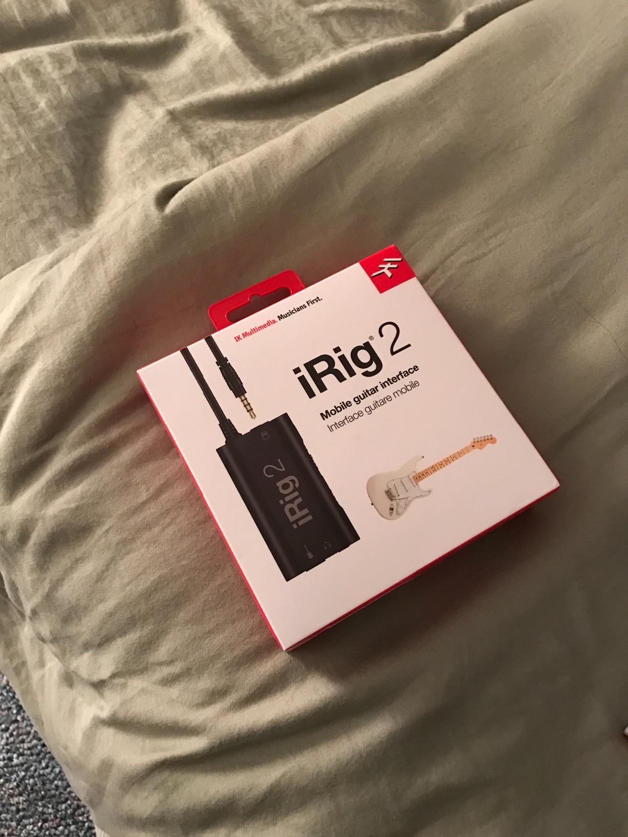 IK Multimedia iRig 2 portable guitar audio interface, lightweight audio adapter for iPhone and iPad with instrument input and headphone/amplifier outs customer photo 1