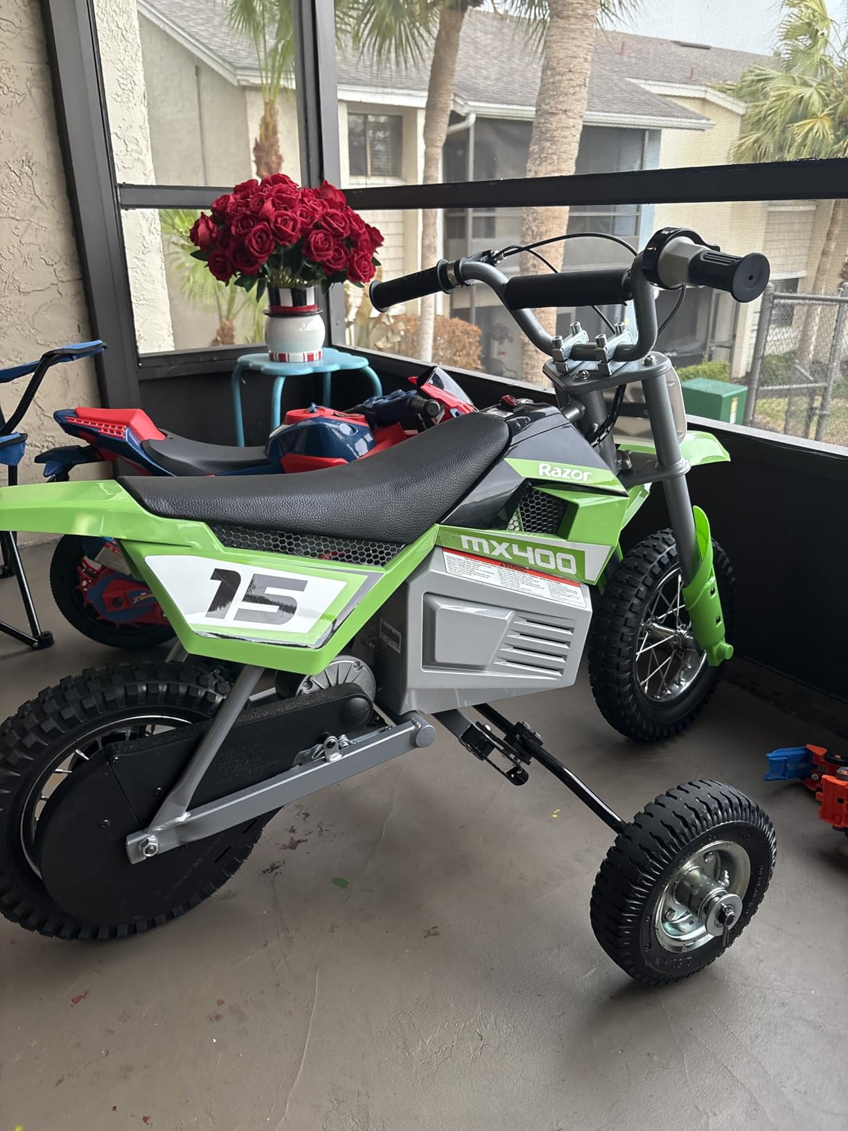 Razor MX400 Dirt Rocket Electric Bike for Kids Ages 8+, 140 Pounds Max Weight, Green – 24-Volt Battery, up to 14 Mph, 30-Minute High Speed Ride Time, Twist-Grip Throttle, 12-Inch Pneumatic Tires customer photo 1