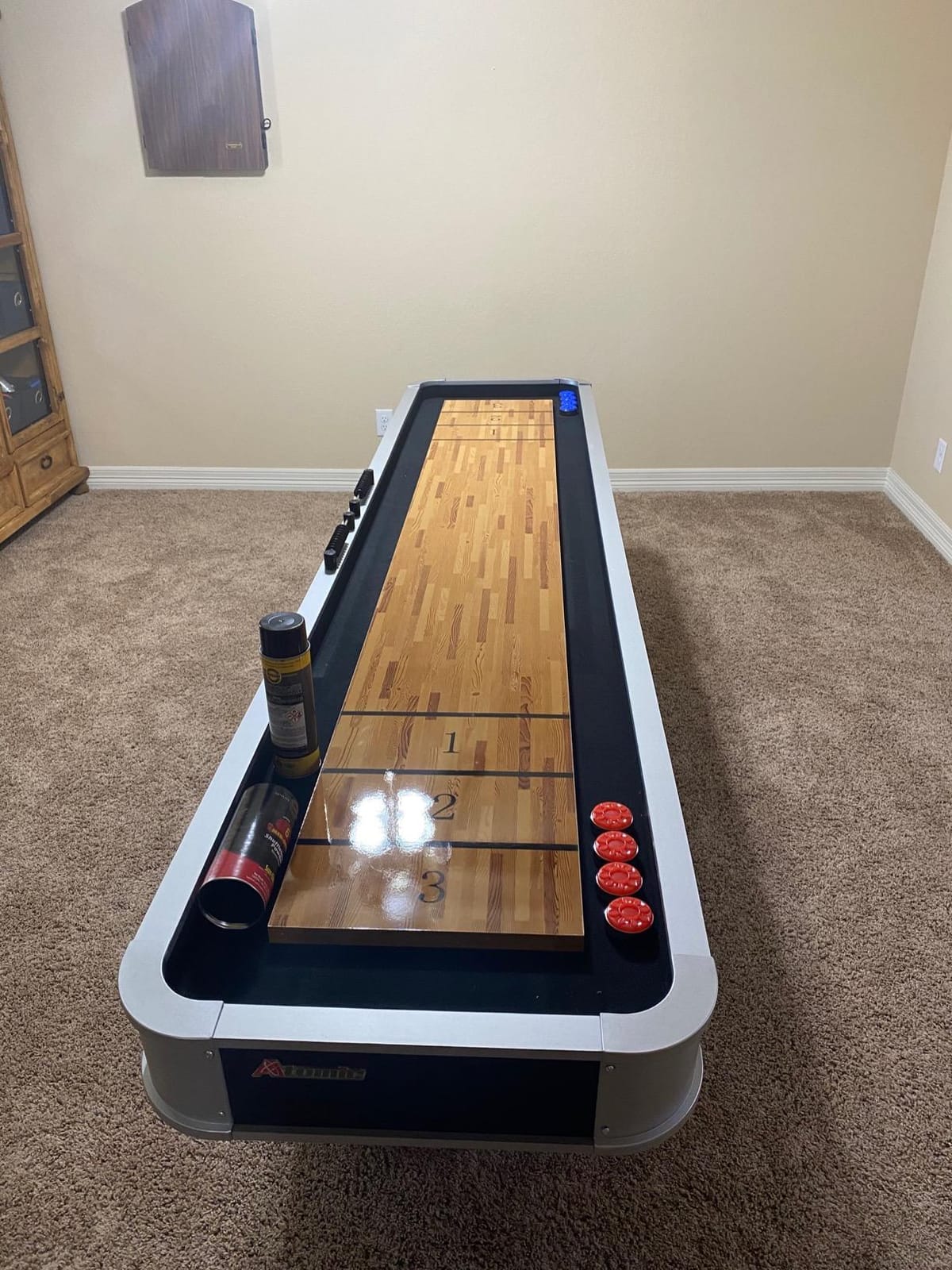 Atomic 9’ LED Shuffleboard Tables with Poly-Coated Playing Surface for Smooth, Fast Puck Action and Pedestal Legs with Levelers for Optimum Stability and Level Play customer photo 2
