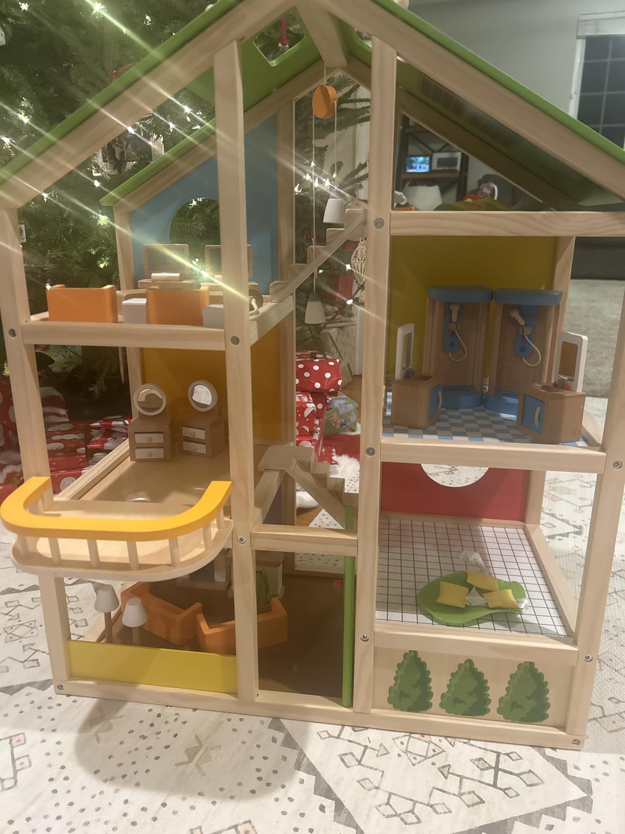 All Seasons Kids Wooden Dollhouse by Hape | Award Winning 3 Story Dolls House Toy with Furniture, Accessories, Movable Stairs and Reversible Season Theme L: 23.6, W: 11.8, H: 28.9 inch customer photo 2