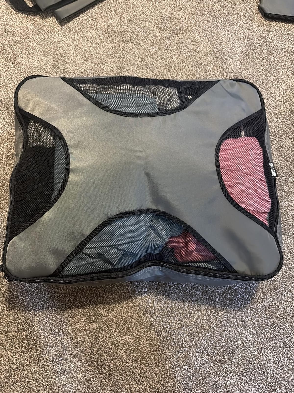 Shacke 5 Set Packing Cubes for Travel with Laundry Bag (Pure Black) | Suitcase Organizer Bags Set: 4 Water-Resistant Luggage Cubes, XL to Small, + Laundry Bag for Carry-On or Checked customer photo 1