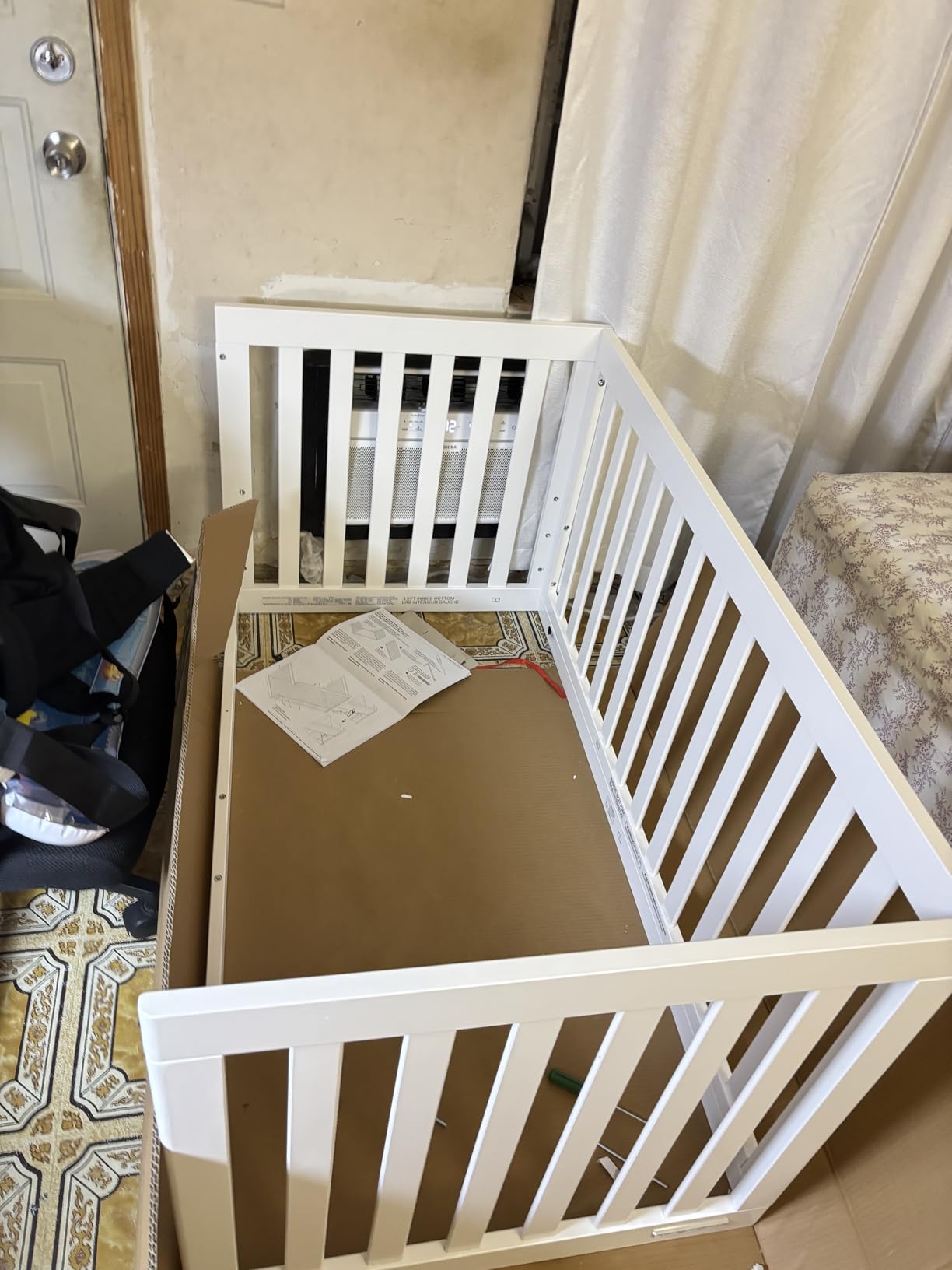 Delta Children Essex 4-in-1 Convertible Baby Crib, Bianca White with Natural Legs customer photo 2