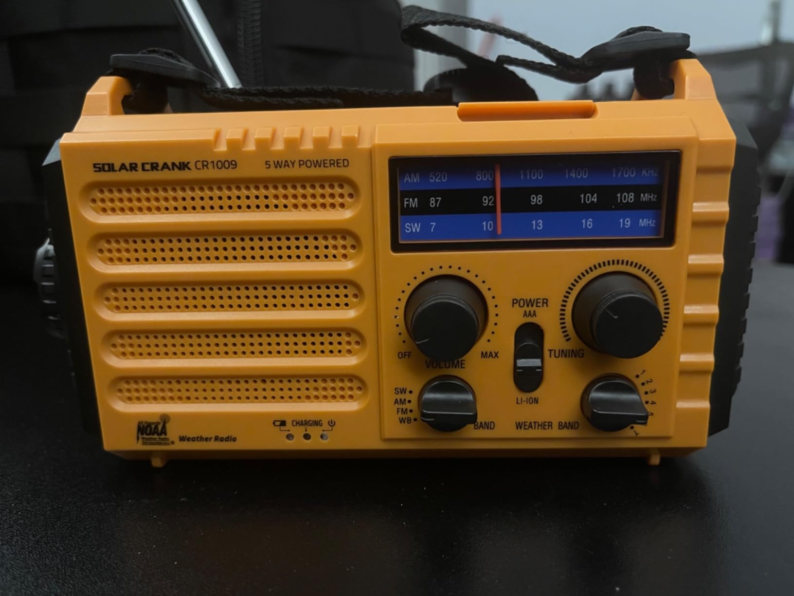 Raynic Emergency Weather Radio, 5000mAh/18500mWh Weather Radio, Portable Solar Hand Crank Radio with AM/FM/SW/NOAA, Cell Phone Charger, Headphone Jack, Flashlight and SOS Siren customer photo 1