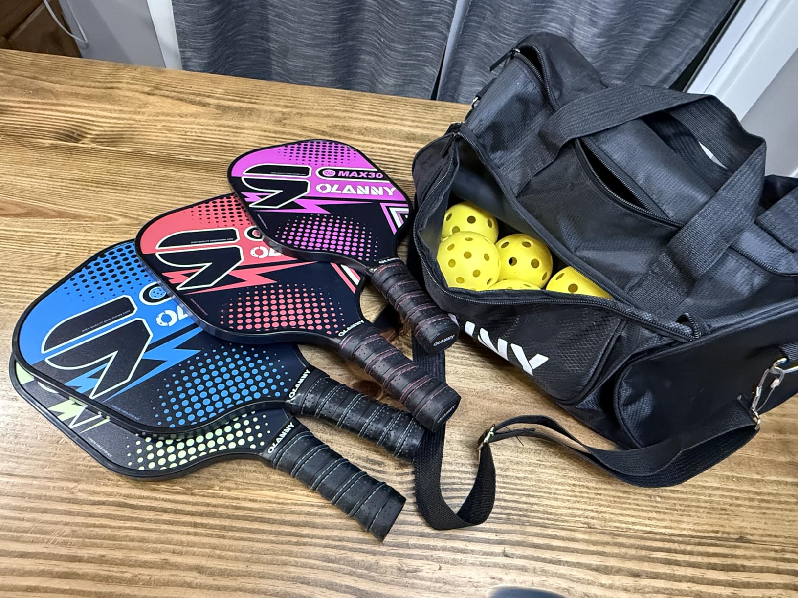 OLANNY Graphite Pickleball Paddles Set- Premium Rackets Fiber Face & Polymer Honeycomb Core Pickleball Set Includes Pickleball Paddles + Pickleball Balls+ Replacement Soft Grip + 1 Bag customer photo 2