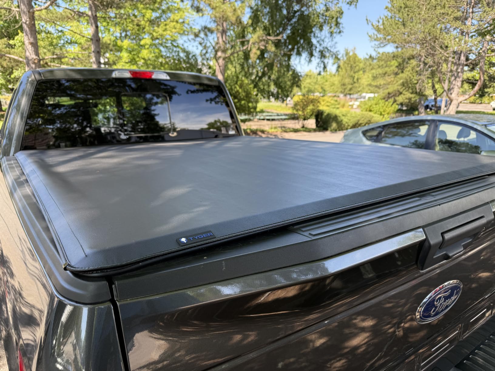 Tyger Auto T1 Soft Roll-up Truck Bed Tonneau Cover Compatible with 2021-2026 Ford F-150; Lightning | 5.5' (67