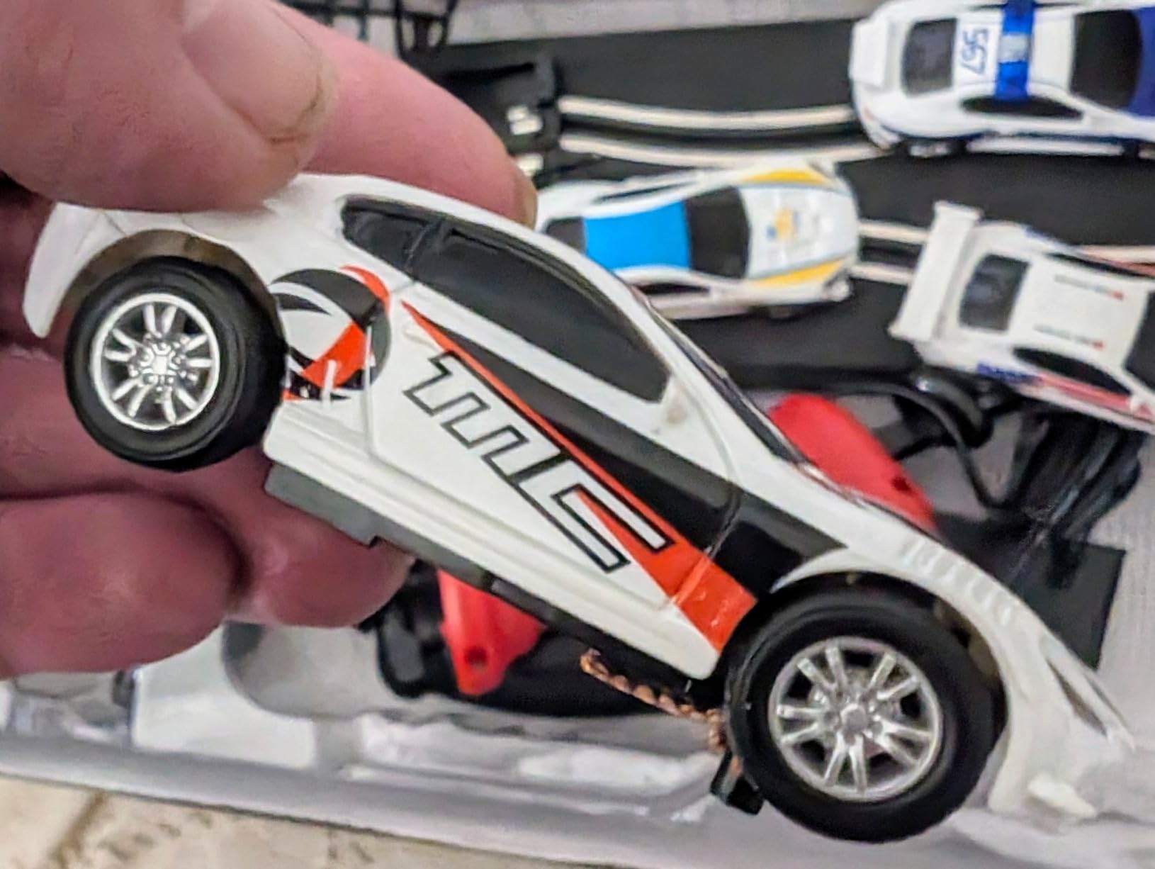 AGM MASETCH Slot Car Racing Track Set with 4 Unique Slot Cars, Battery Powered or Electric Car Track, Gift Toys for Boys Girls 4-12 Years Old customer photo 2