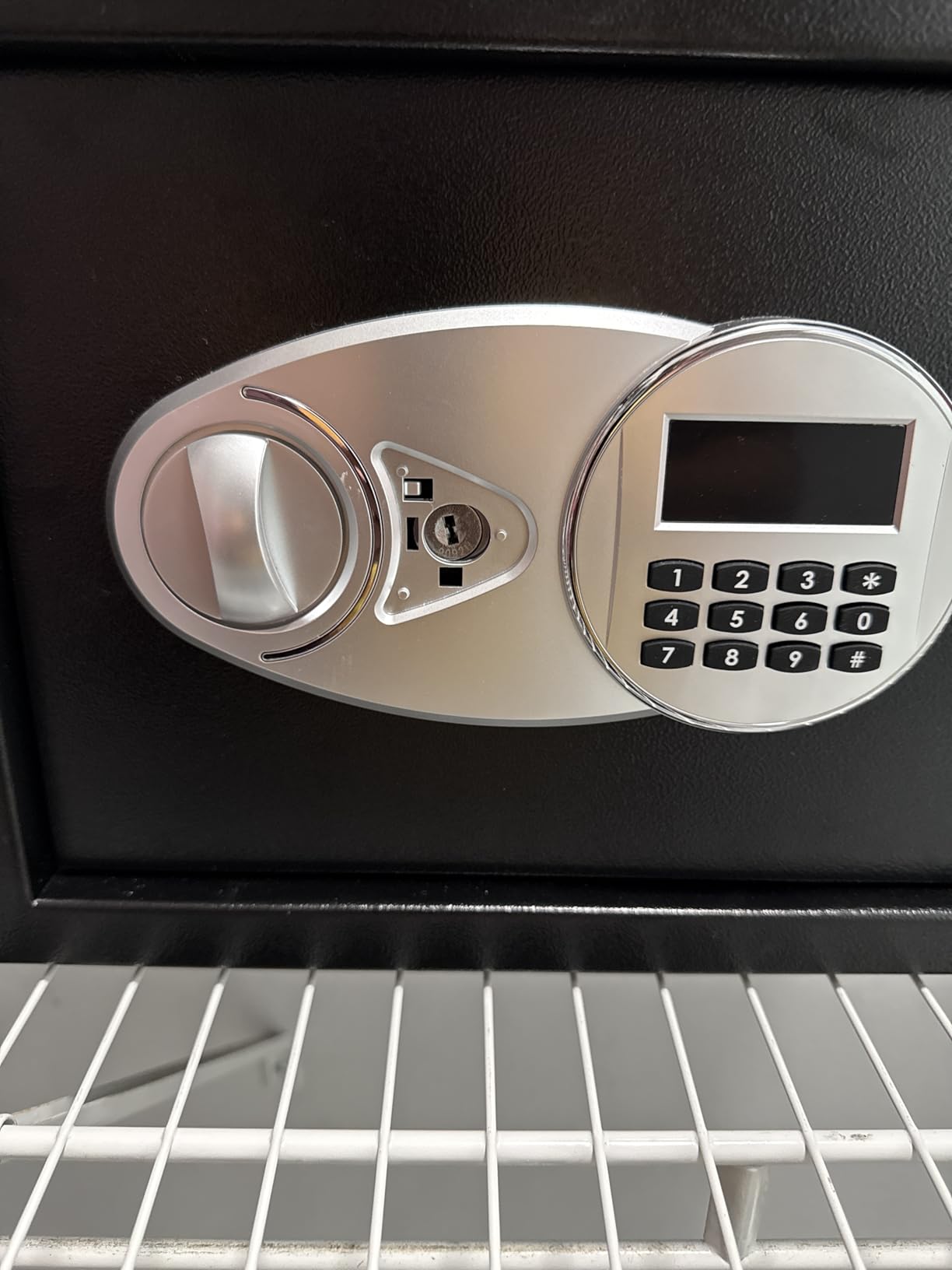 Amazon Basics Steel Security Safe and Lock Box with Digital Keypad, Electronic Lock, Emergency Key Open, Secure Cash, Jewelry, Documents, Black, 0.7 Cubic Feet, 16.9-x-14.6-x-7.1-inches (WxDxH) customer photo 2