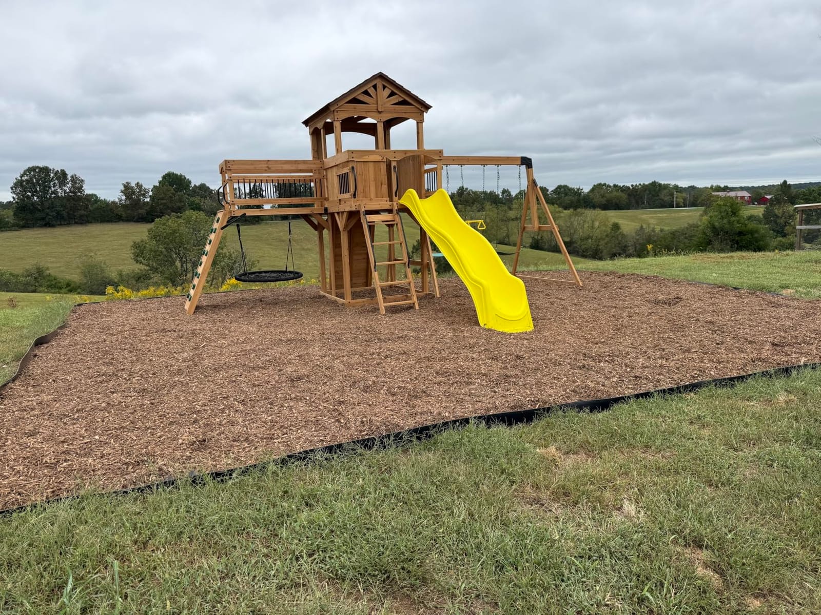 Backyard Discovery Dover Bay Spruce Wood Swing Set with Wave Slide, Clubhouse, Monkey Bars, Rock Wall, Belt Swings, Step Ladder, Toy Telescope, Chalkboard, Outdoor Playset customer photo 1