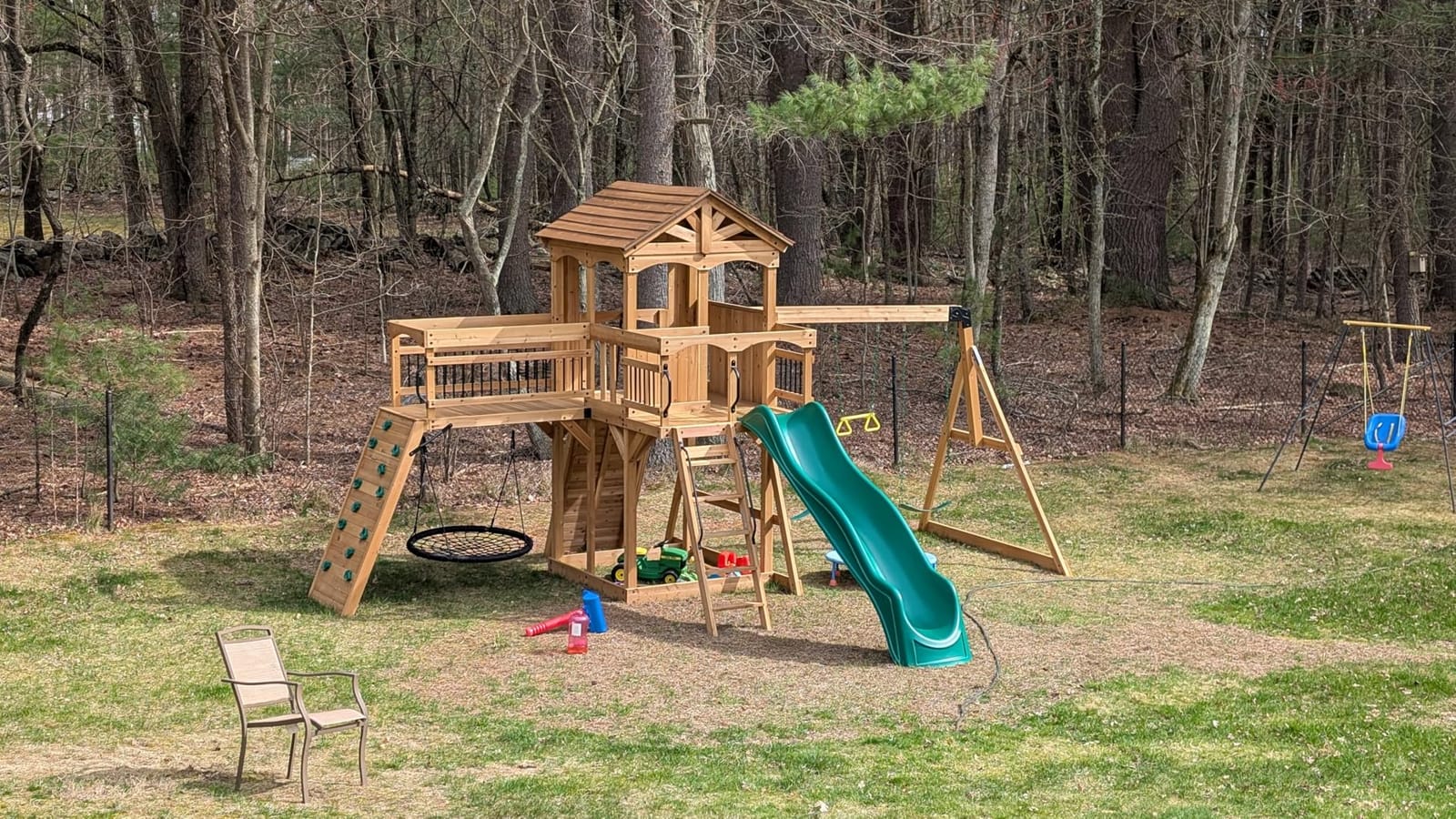 Backyard Discovery Dover Bay Spruce Wood Swing Set with Wave Slide, Clubhouse, Monkey Bars, Rock Wall, Belt Swings, Step Ladder, Toy Telescope, Chalkboard, Outdoor Playset customer photo 2